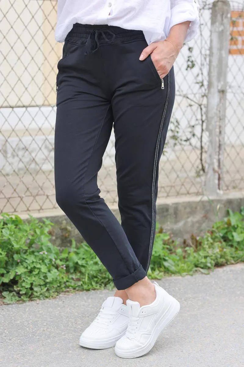 Jogging confort noir ceinture élastique liseré brillant sur les cotes